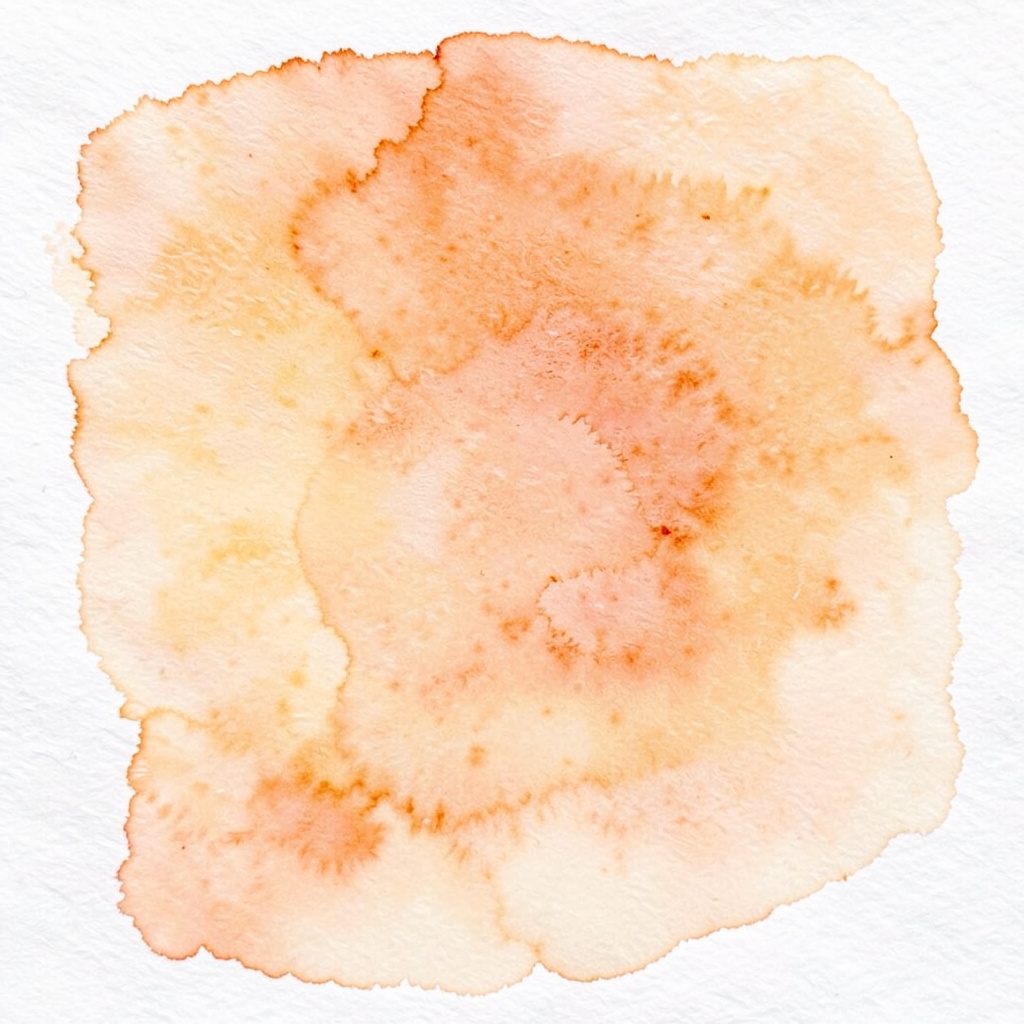 Soft watercolour sketch of a desk with pencils and open notebook in warm parchment tones